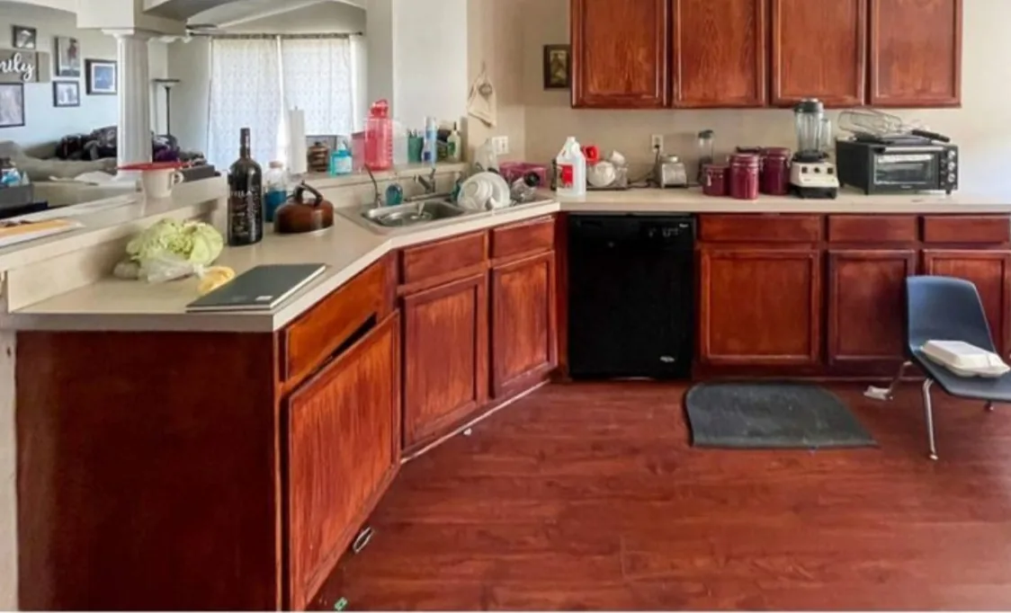 Before: Kitchen before the remodel: red cherry cabinets