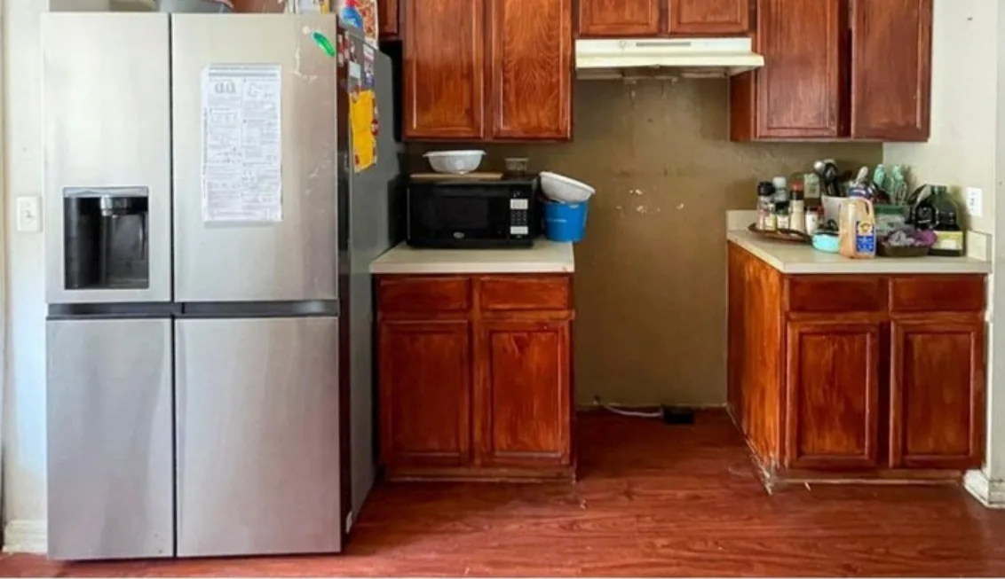 Before: Kitchen before the remodel: cherry cabinets