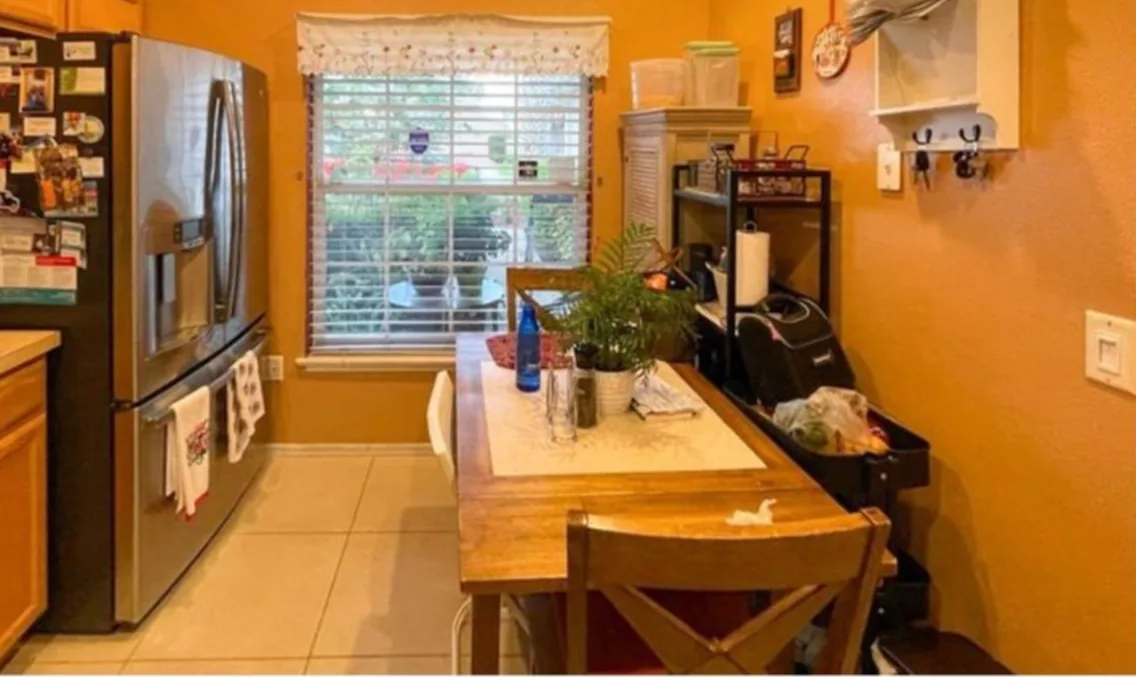 Before: Kitchen before the remodel: oak galley kitchen