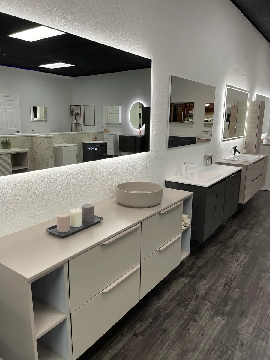 Light gray vanity with vessel sink on display